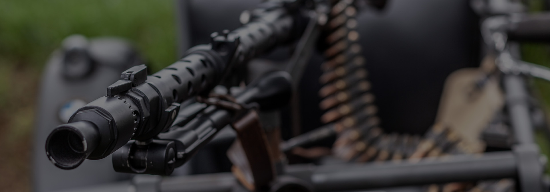 Close-up view of a belt-fed German MG34 machine gun with ammunition belt at Terra Bellum